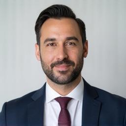 Professional headshot of Mehmet Yilmaz, Senior Associate.